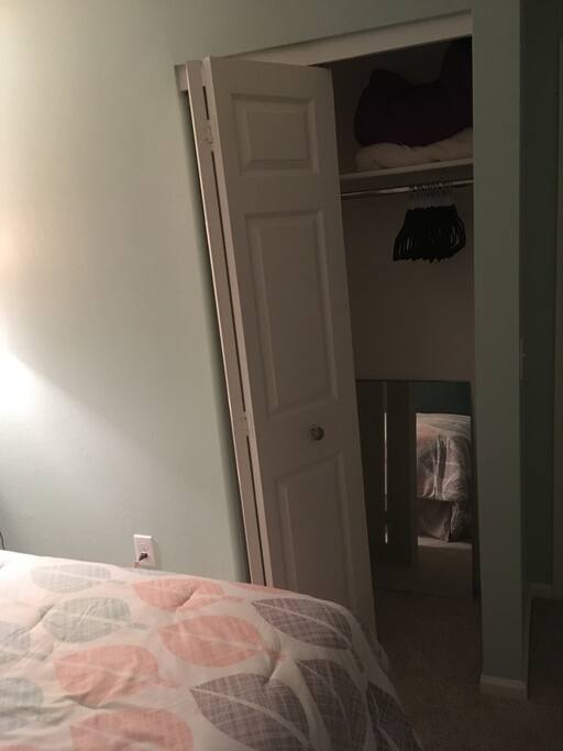Closet space in bedroom.