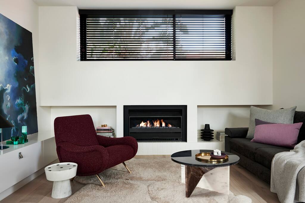 Please note, artwork is not here anymore! Has been replaced with wide screen TV and other artwork! The armchair and coffee table are also not here anymore.