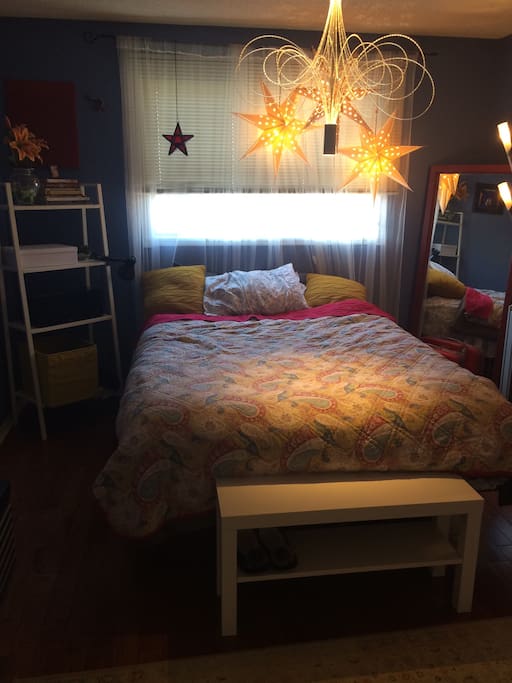 The Bedroom - airy, bright and colourful with plenty of soft lighting and places to store your stuff. There's a TV in the room that you can hook up to your laptop for Netflixin'.