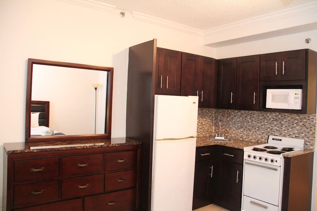Full Equipped Kitchenette.Refrigerator,stove,oven,microwave, utensils,and Coffeemaker