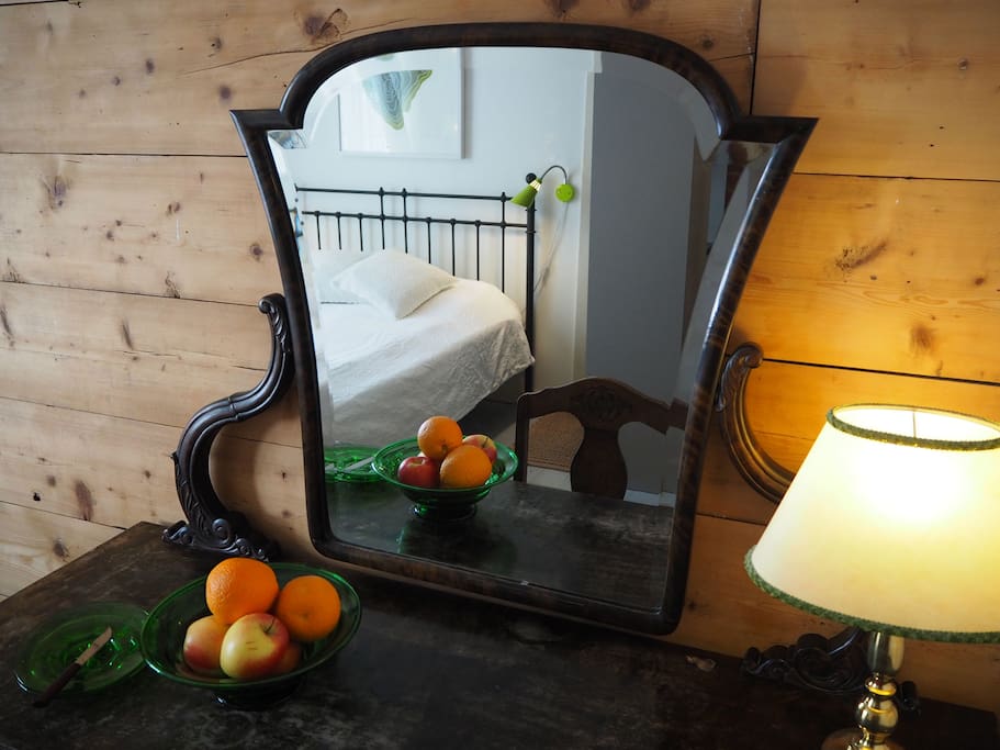 a desk with mirror, good enough size for working on your computer/laptop, also with a suitable chair