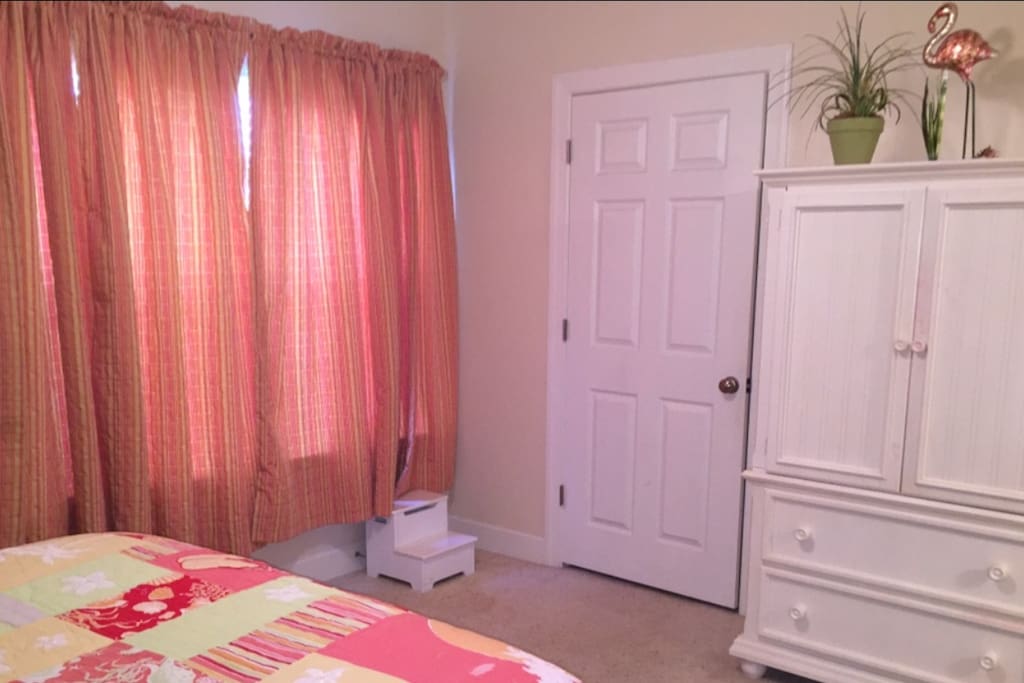 Master bedroom large closet & armoire with tv