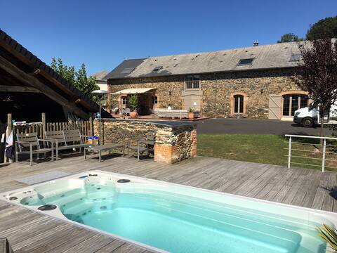 Barn renovated into a family home with a hot tub