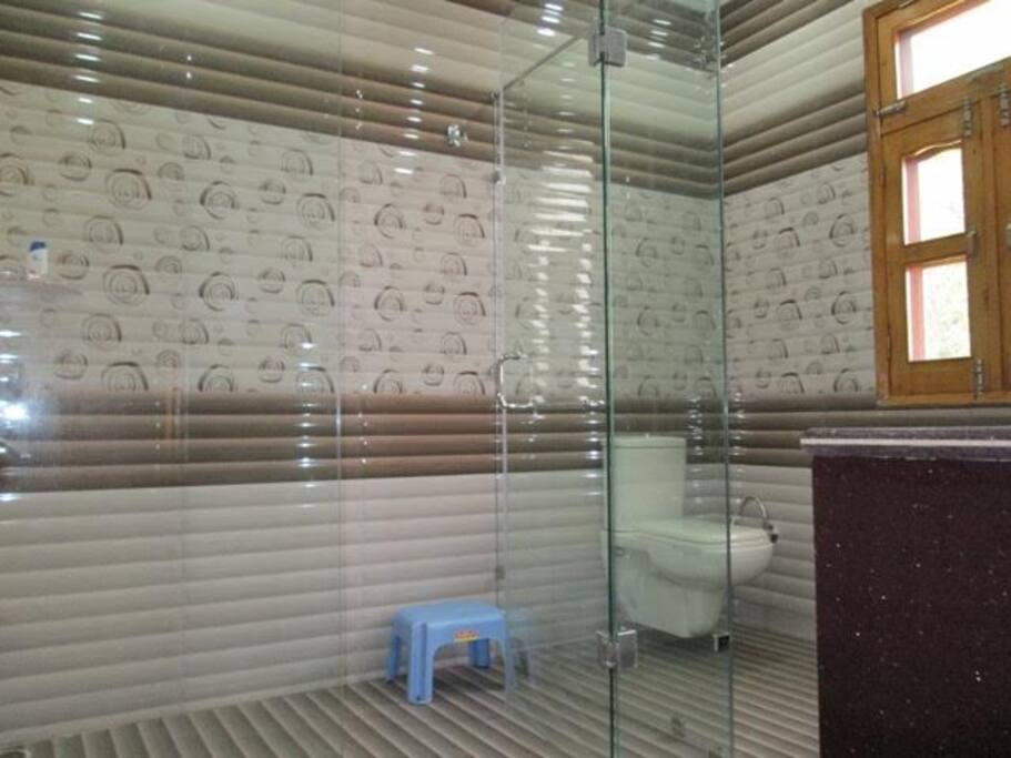 Attached washroom with glass separation