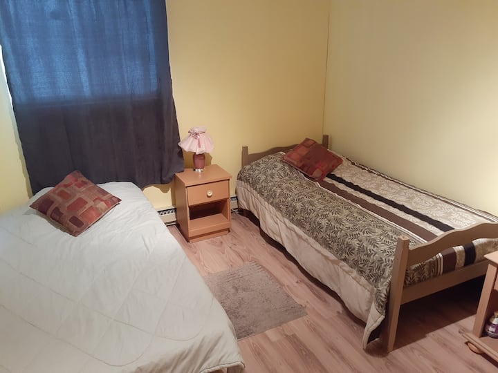 Bedroom # 3 with two single beds 