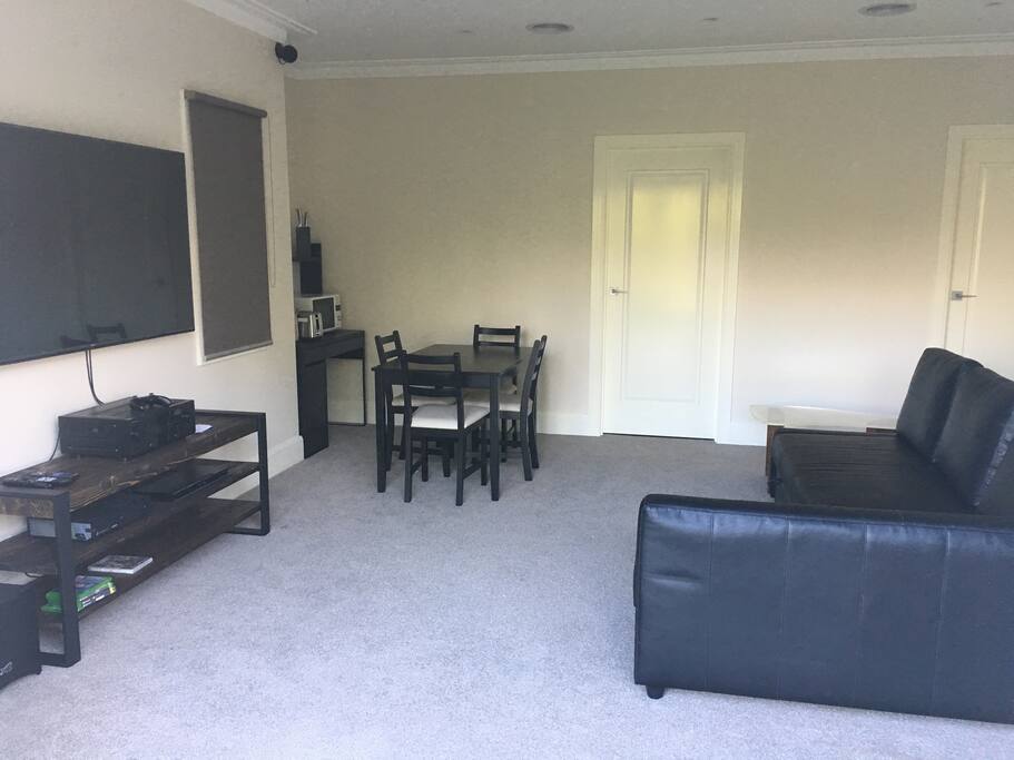 Lounge with double fold out sofa bed.