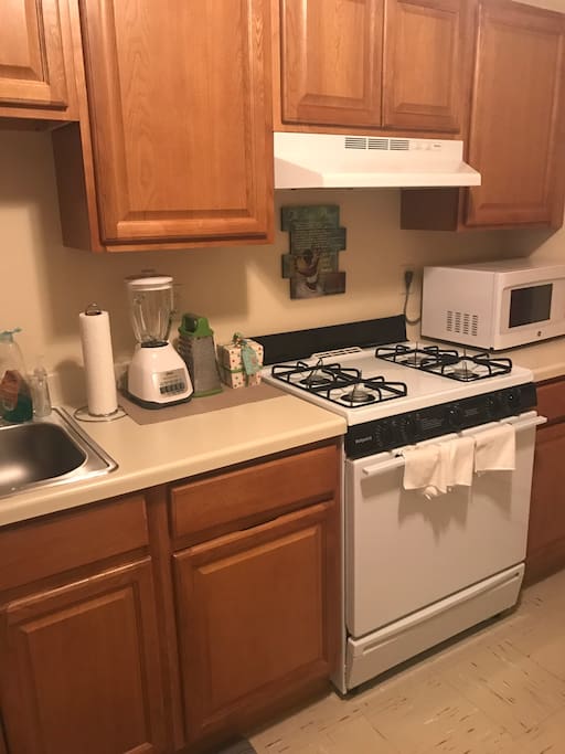 Kitchen . There’s a kitchen table if u wanna eat here too. Very clean for u to enjoy your cooking