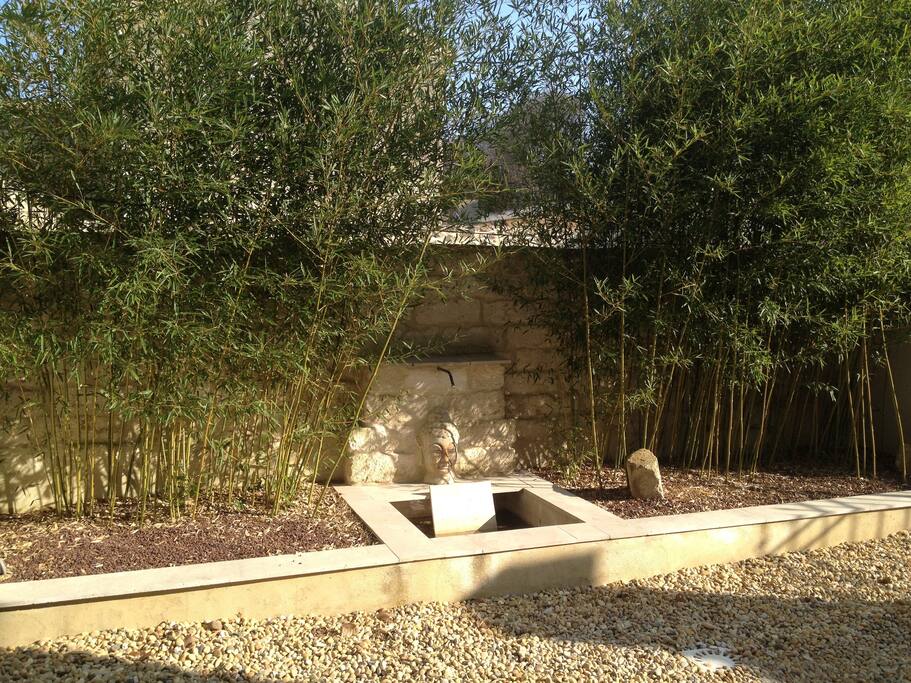 Buddha fountain in the courtyard, refreshing when it's hot