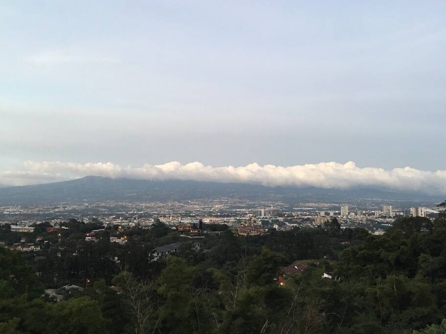 Escazú is a popular area where many North Americans, Costa Ricans and other foreigners live.
Escazú is sometimes called the “Beverly Hills of Costa Rica” because of its upscale ambience. The town is located about five miles west of San José, 10 to 15 minutes driving time on the old two-lane road or newly revamped highway. Most of this suburb is located on hilly terrain, so it is especially appealing to those people who like cooler temperatures. Escazú is one of the most popular places for English-speaking foreigners to live. An American who lives there said, “Escazú is an odd modern mixture of micro niches and little islands of green, stitched together by pot-holed roads and pocked with condo complexes, great mansions behind big gates and small barrios where the wash bakes in the noonday sun.” The town has beautiful century old churches, farmers on oxcarts, many strip malls old adobe houses, one of the country’s most modern hospitals (CIMA hospital), a huge shopping mall (Multiplaza) and countless bars and restaurants.
Old Escazú has some of its quaint traditional feel, despite the condominiums and strip malls going up all around it. In some places adobe buildings still line the narrow roads, and the whitewashed church, the park, and the soccer field still dominate the center of town. Farmers can be seen riding their horses up the streets to and from their farms, a reminder that not everything in Escazú has been quick to change.
Despite having neighborhoods that are still quaint and country-like, Escazú has all the amenities of any North American suburb with U.S. style-living including the best shopping and dining in Costa Rica. Parts of of the town resemble America so much that you may have to blink twice to make sure you are not back in the U.S.
The most commercial part is San Rafael or the lower section. The old main street is now called the “Golden Mile”, a four-lane road jammed with traffic where fast food restaurants and pricey clubs and cafés line both sides of the street (anything from typical Costa Rican places to Tony Roma’s and TGIF Friday’s). In Escazú you can find just about anything including: mini strip malls with clothing stores, English-speaking private schools, pharmacies, a Walmart megastore, trendy shops with name-brand clothing, upscale beauty salons, doctors and dentists, private mail services and more. The neighborhood of San Rafael has a good choice of condos for sale. If you are looking at luxury homes for sale, you might find it right here as there are a lot of them hidden away in areas like Trejos Montealegre.
One advantage to living in Escazú is that you are near Hospital Cima, one of the country’s two best private medical facilities. The country’s largest shopping complex is Multiplaza Escazú, a shopping mall full of U.S.- and European-brand chain stores, several restaurants, a multiscreen movie theater and an Automercado supermarket (the top-end supermarket). Several large furniture and interior stores, PriceSmart and Office Depot, the Real Intercontinental Hotel, and the Plaza Roble office complex can be found in the same area. On the north side of the highway, there is trendy dining for the Costa Rican yuppie set and even one of Costa Rica’s three Hooters restaurants. Avenida Ezcazú, next to Cima Hospital, is Costa Rica’s version of Rodeo Drive. It features a Marriott Courtyard hotel, buildings that house different businesses on the ground floor with offices on upper floors, a state-of-the-art movie theater, upscale restaurants, a multitude of brand name designer stores and Costa Rica’s first Starbucks.
San Antonio de Escazú, which is up in the hills is more affordable for expats and is the quiet area of Escazu. It’s located higher up on the mountain, but it’s only a couple of minutes from the rest of Escazú. This area is not as developed as the other parts of Escazú and is a mixture of the rural with the city.
Some parts of Esacazú are eclectic where you’ll find mansions with shacks as their neighbors. Most condos in Escazú are located in different areas. You can find pretty almost anything in Escazú, from low-, mid-, and high-rise condominiums to houses in gated communities to traditional tico-style houses up in the hills. A few lots are still available as well, though not many, and they’re very pricey. At night hillside homes have fantastic panoramic views of the twinkling lights of the Central Valley.
Guachipelín or Guachi, as the locals call it, is the newest and most modern part of Escazú. In addition to the strip malls, hotels, the huge MultiPlaza shopping mall, Cima hospital, PriceSmart (Costco in U.S.), supermarket and many other businesses, there are also many residential areas offering new homes starting at the $100,000 all the way up to the $1,000,000 million price range.
If you like a large selection of restaurants, many activities to stay busy like yoga and gyms, good shopping and Costa Rica’s version of Miami, then Escazú might just be the place for you.