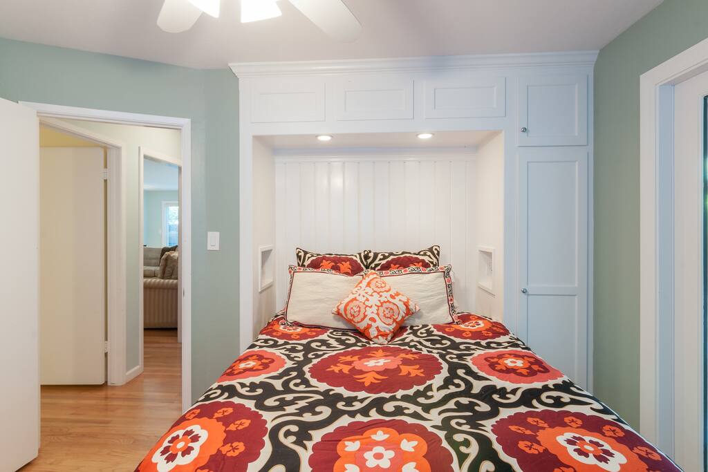 The bedroom offers built in lights on each side of the bed.