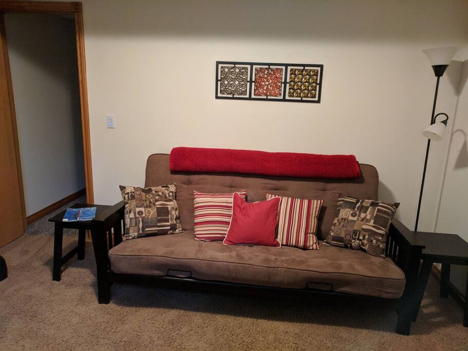 Futon opens to a double bed for extra sleeping.