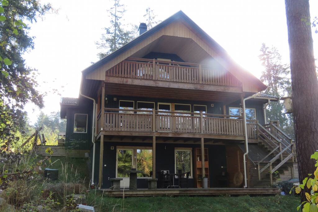 Back of villa. The windows face a pine forest.