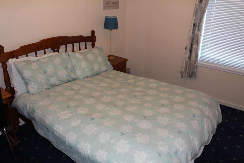 This is the larger bedroom