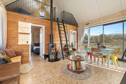 Shipping Container Cabin by the Clutha