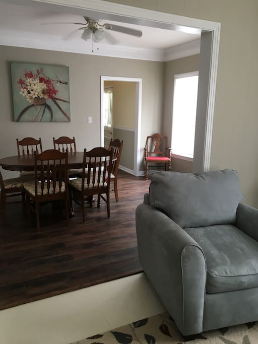 From the living area through the dining area to the kitchen.