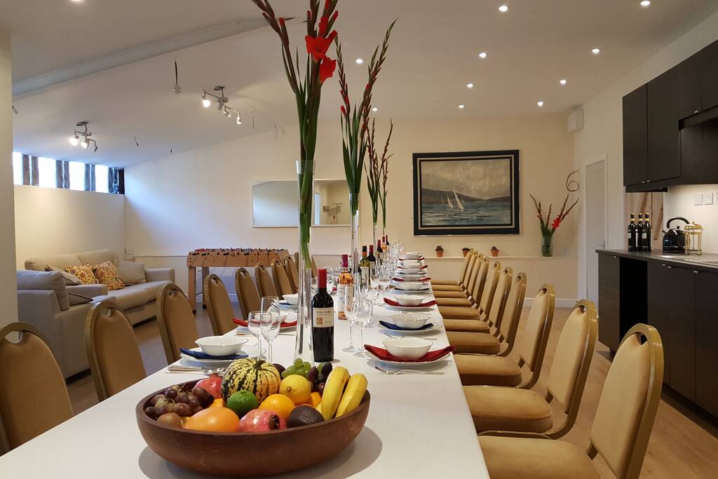 The Club Dining Room laid for a dinner party for 20.