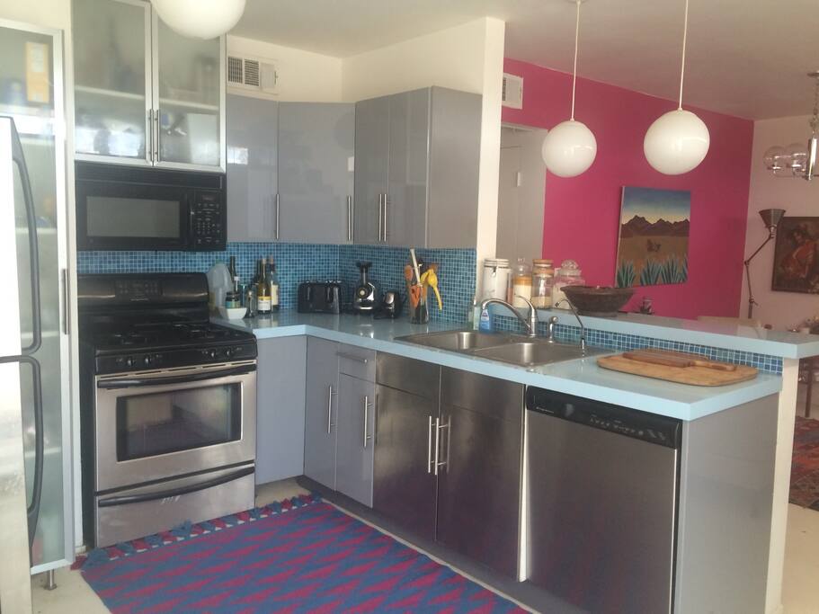 A bright well-stocked kitchen.