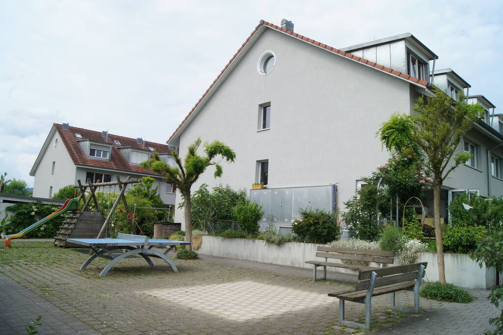 House with the playing ground in front