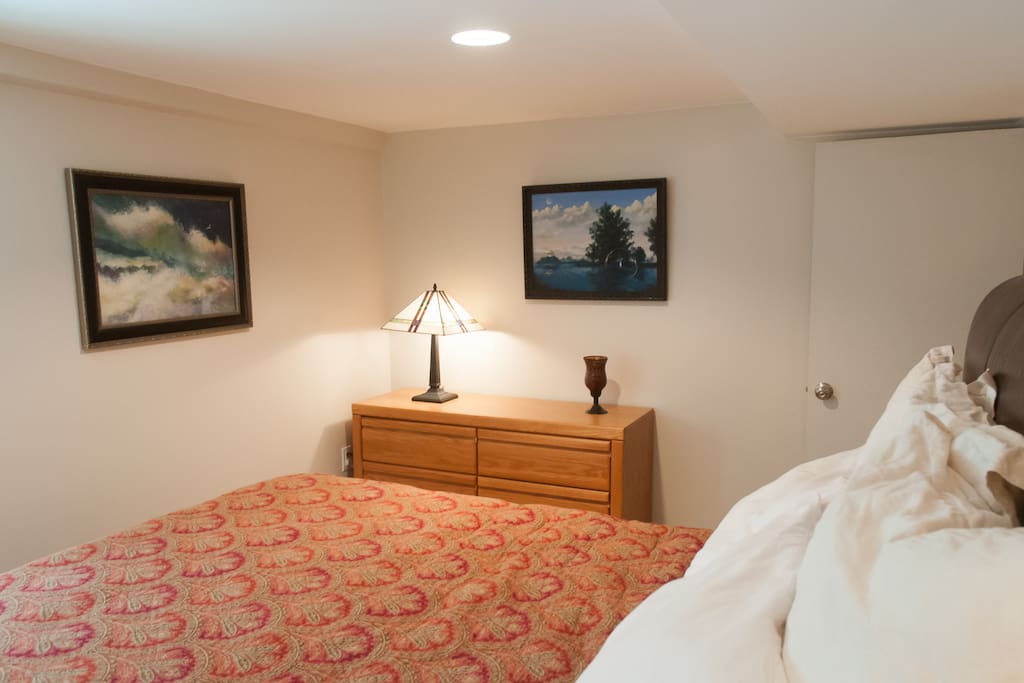 Freshly remodeled room for rent with leather headboard and comfortable queen mattress