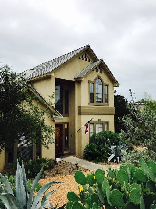 The relaxing landscape is completely xeriscaped with native plants and lawn.