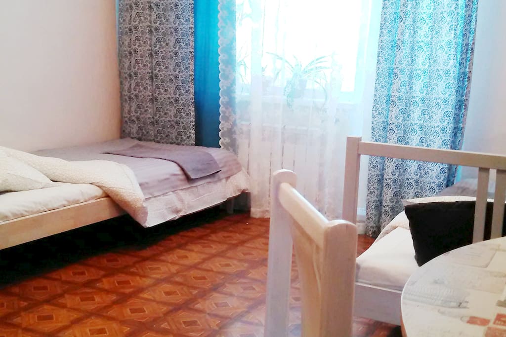 спальное место в гостевой комнате bed in the sharing guest room