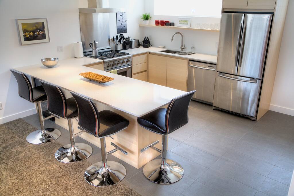 Full size kitchen with every appliance you need. Gas stove and wine fridge!