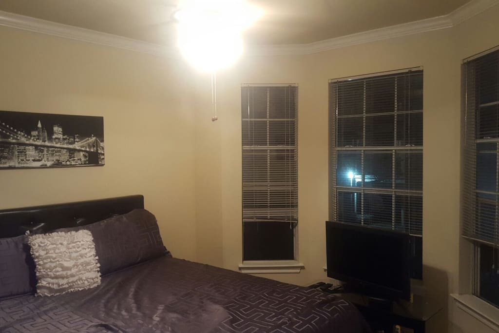 King Size Bed and Tall Windows!!