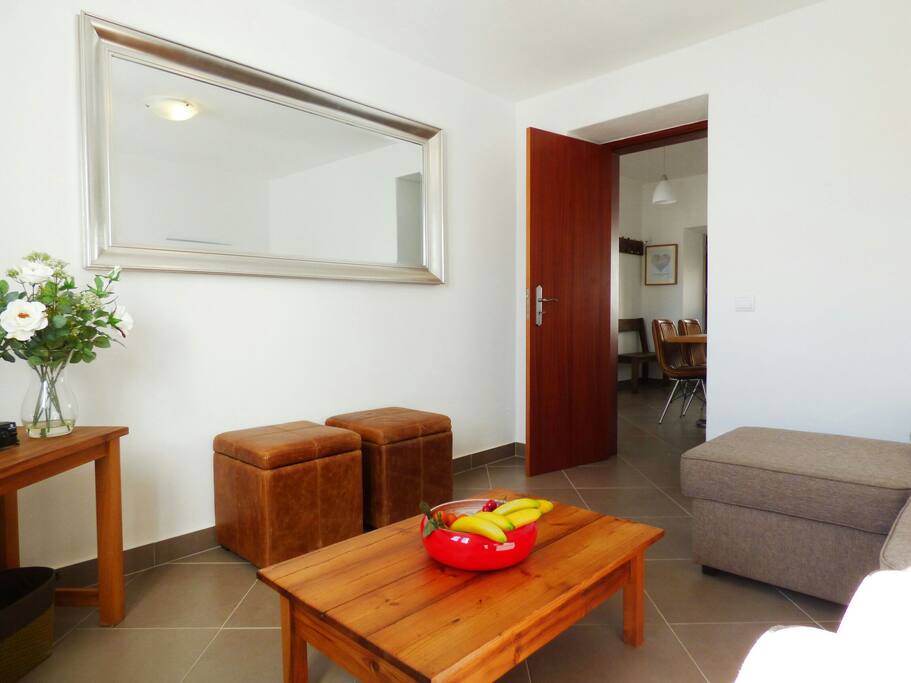 Sunny living room with TV for rainy days or quiet evenings in