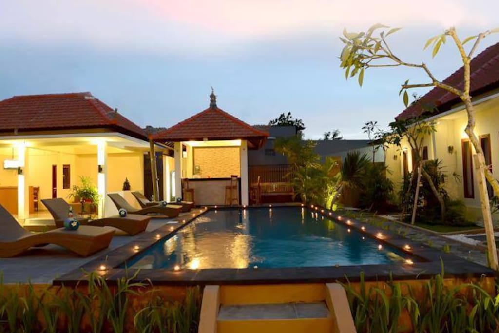 Beautiful pool with surrounding apartments.