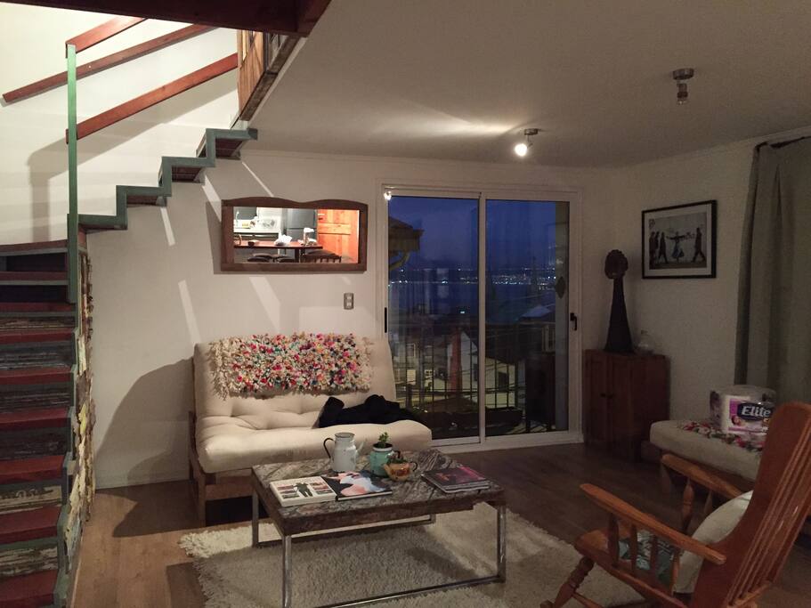 Living room (futon for extra person) and stairs to bedroom