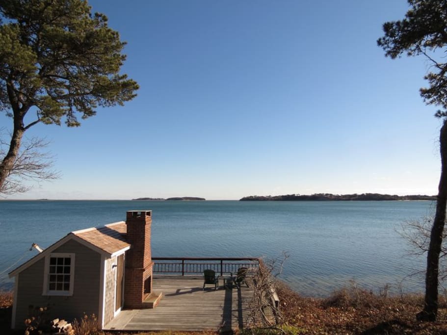 Large deck with fireplace on Pleasant Bay. It's truly one of a kind