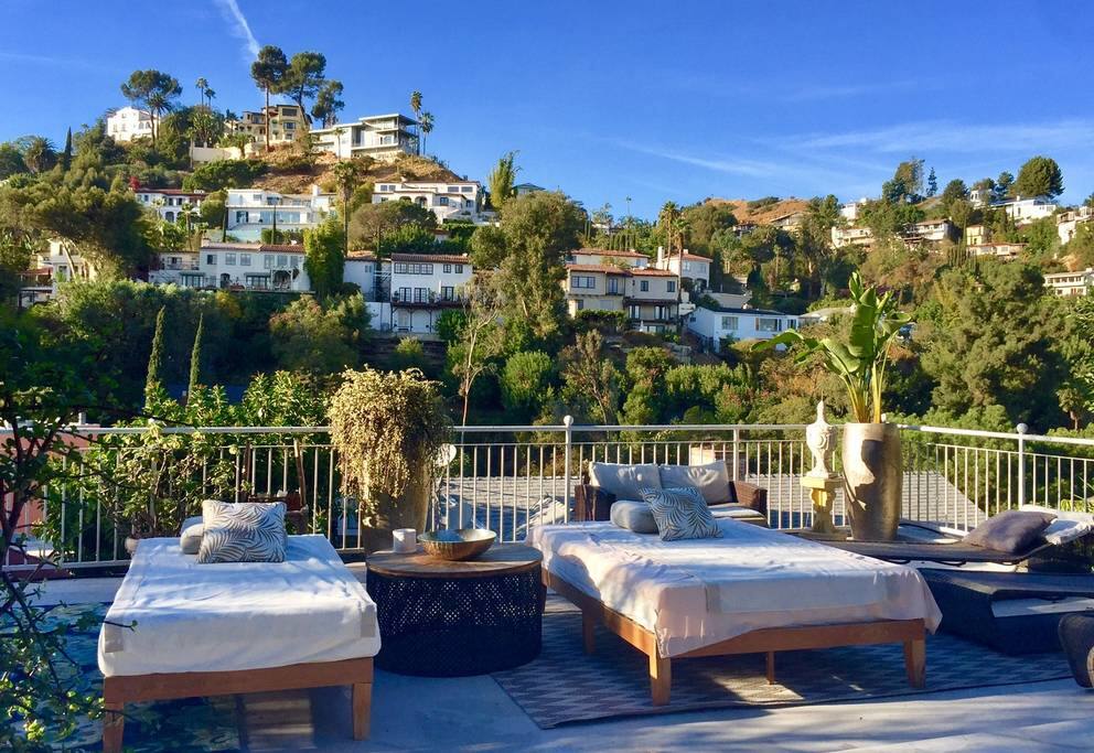HUGE outdoor living space complete with resort beds for lounging and star gazing!