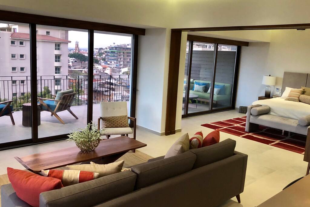 Living room and master bedroom as seen from the kitchen.