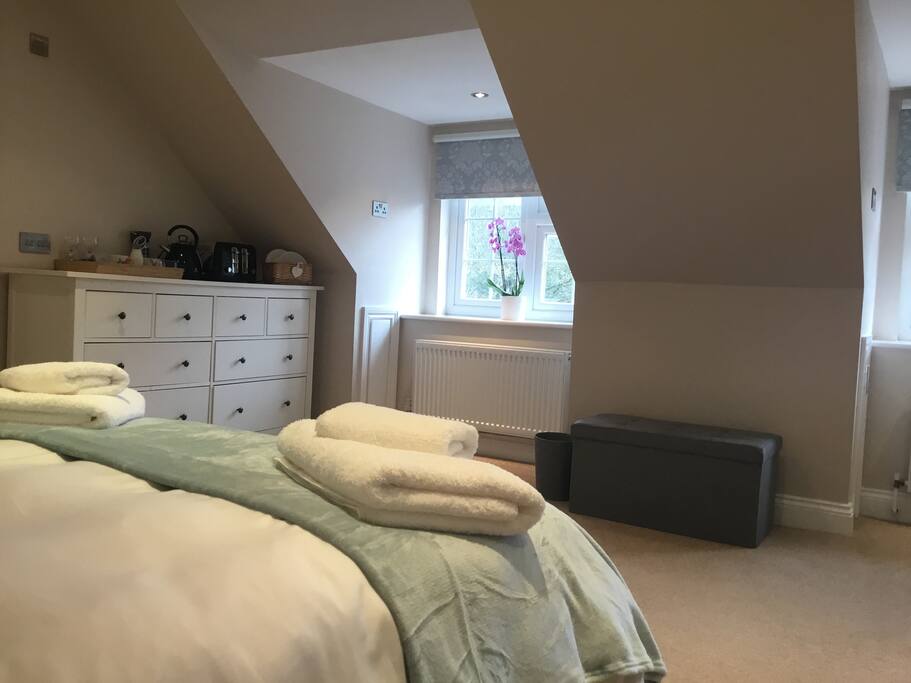 Plenty of storage with a large chest of drawers and a built in wardrobe.