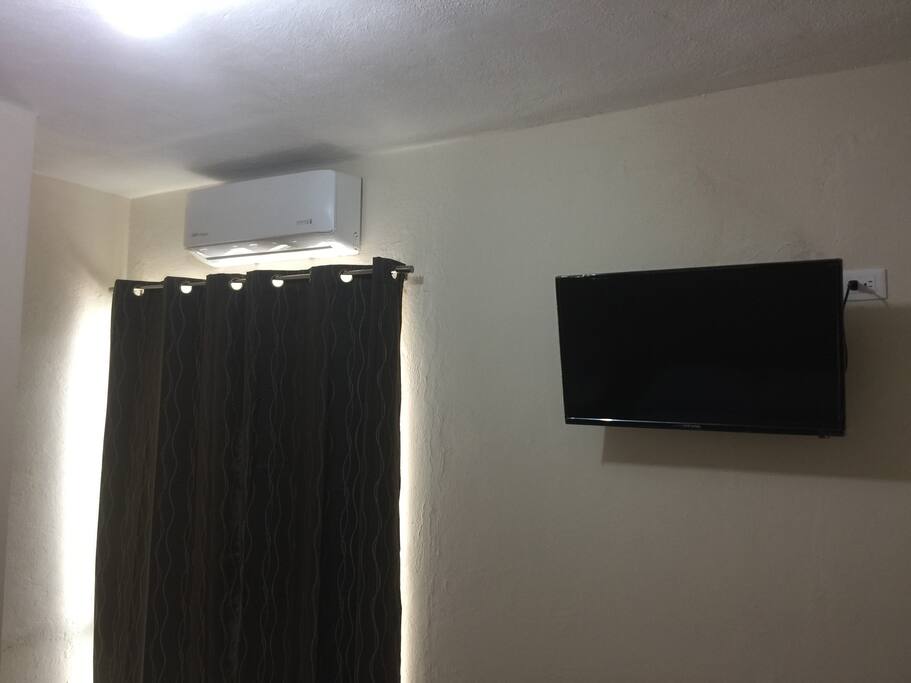 Aire acondicionado y televisión en las recámaras