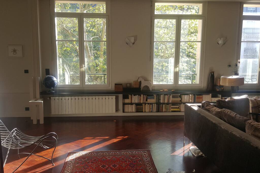 Living room opening onto dining room on the left