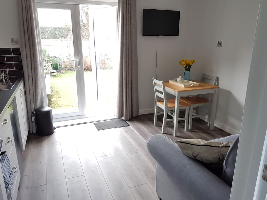 Separate lounge/breakfast area with TV, kitchenette and views on to pretty garden