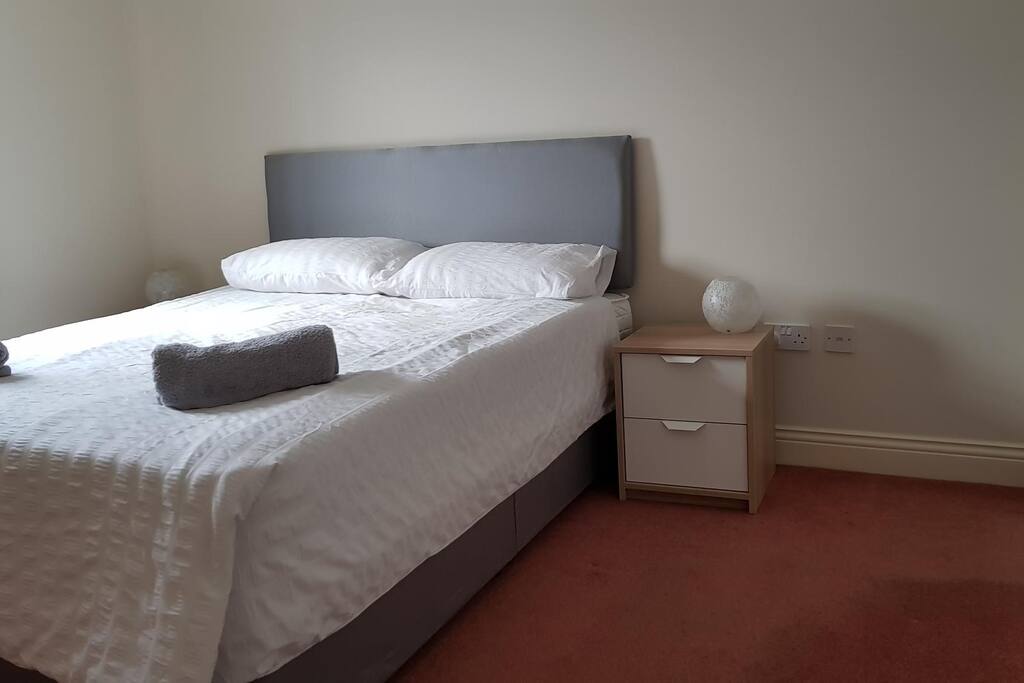 Bedroom 1 with King Size bed and en-suite bathroom