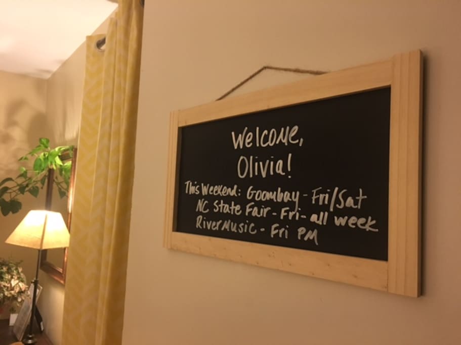 A chalkboard sign on your bedroom door welcomes you and shares local happenings