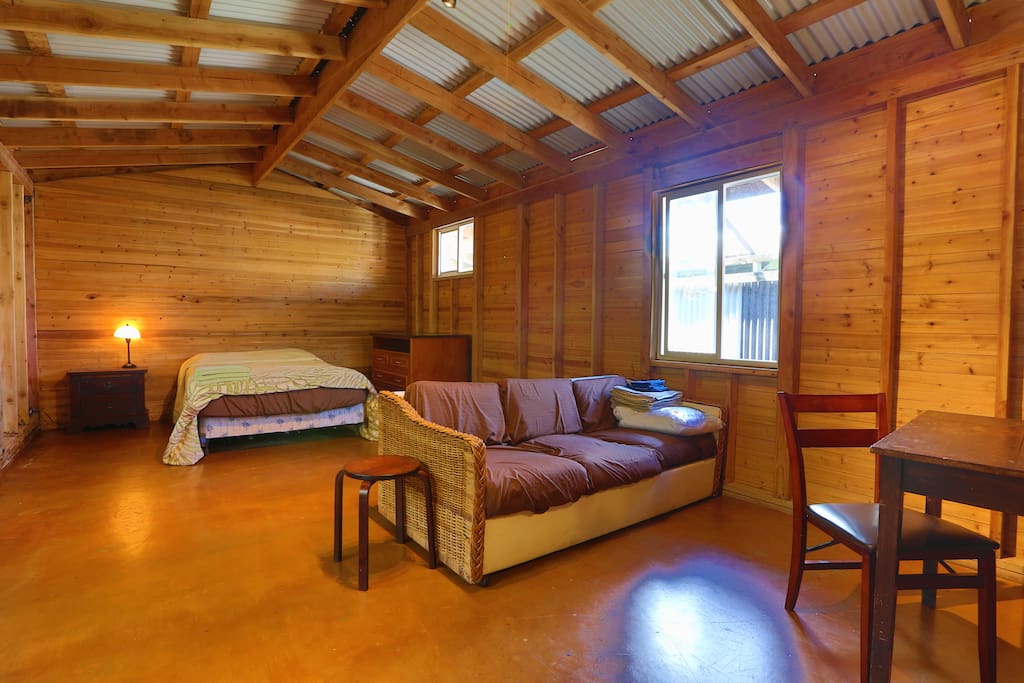 Large open living area with a pullout couch