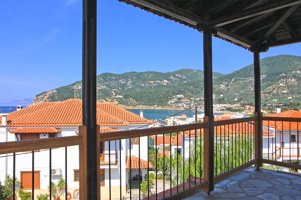 Large covered balcony with panoramic view, to enjoy summer breeze at your leisure.