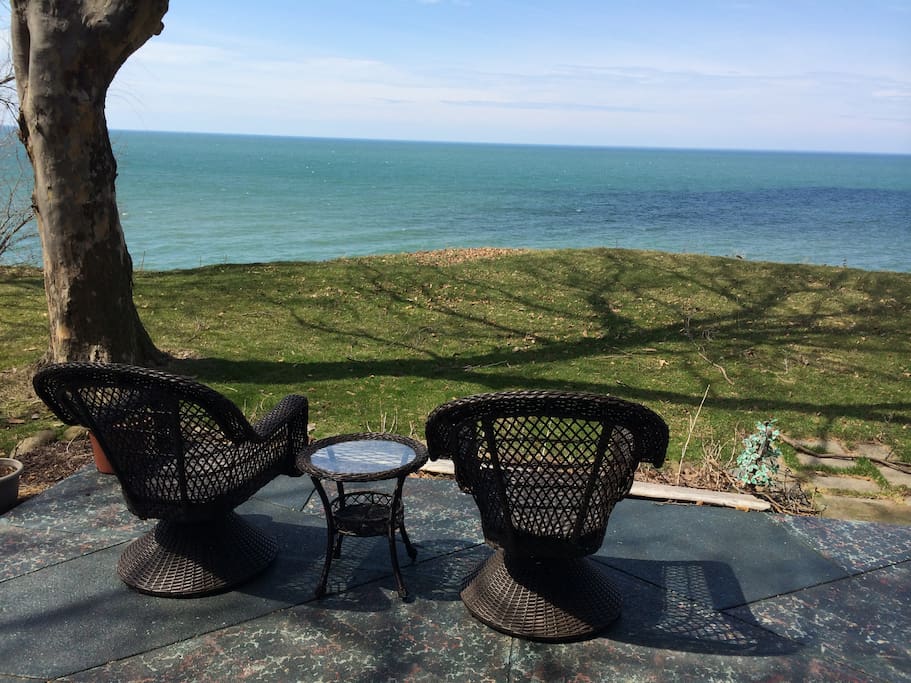 Back porch with lake view & view of Cleveland skyline on clear days. 6 chairs available - perfect for an outdoor breakfast, lunch or dinner!