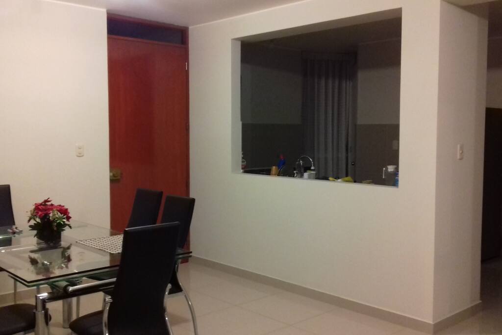 Sala con Vista cocina abierta