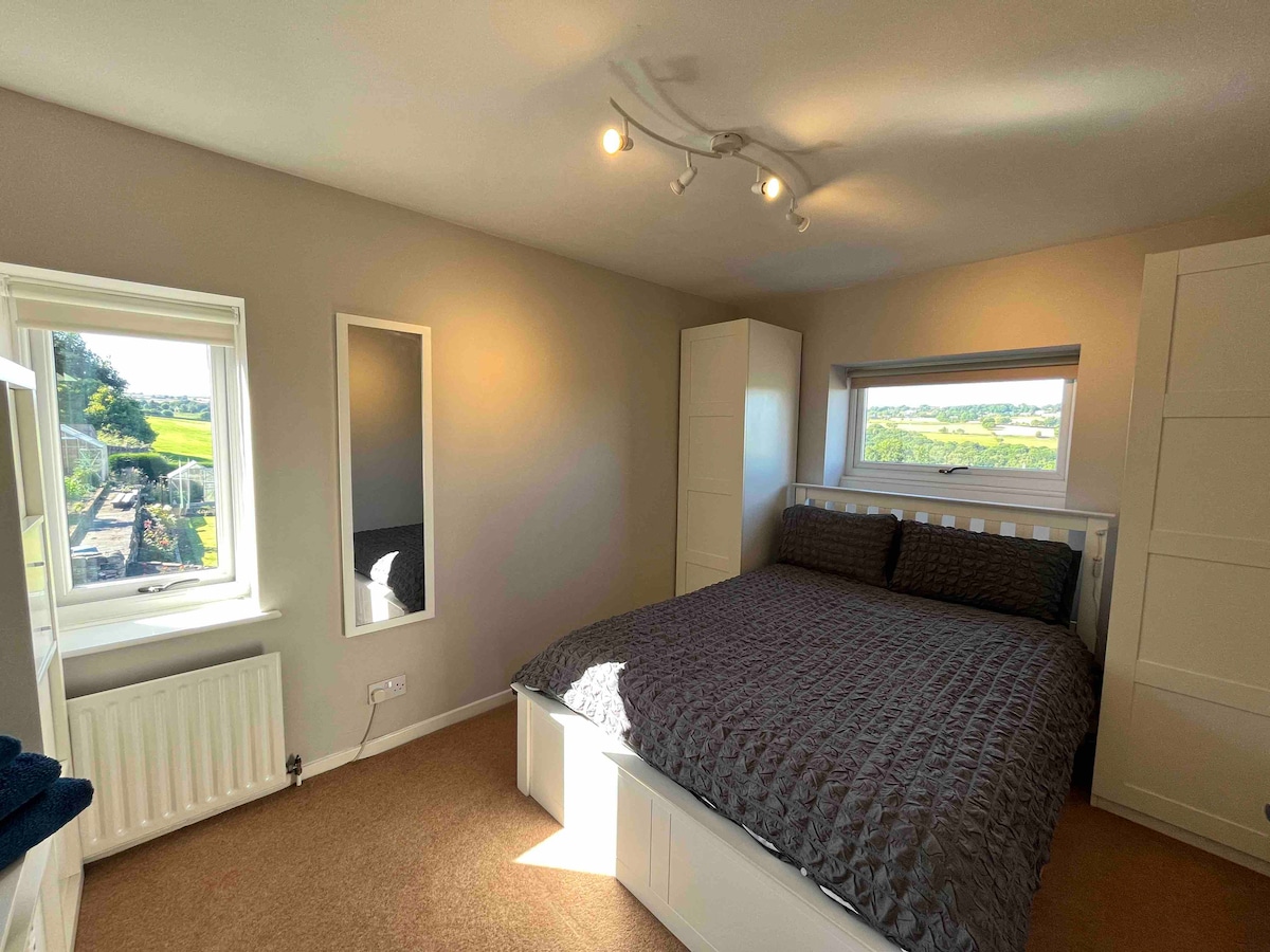 Main bedroom with double bed,  2 wardrobes, tv cabinet with storage and smart tv. 