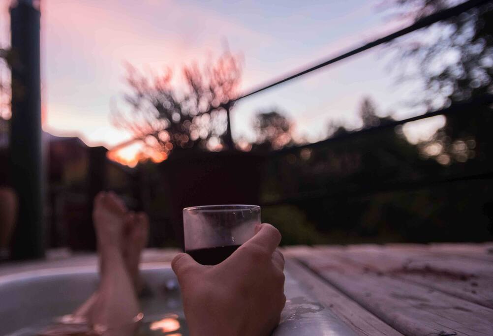 The clawfoot bathtub on the deck, it can cozily fit two.