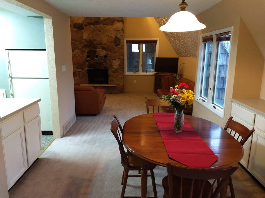 Main floor, private entrance, 1 Queen bed, full bath, living space and patio.