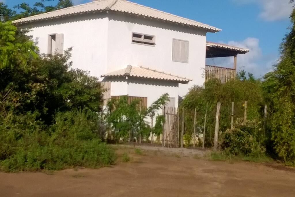 Back of the house with laundry room
