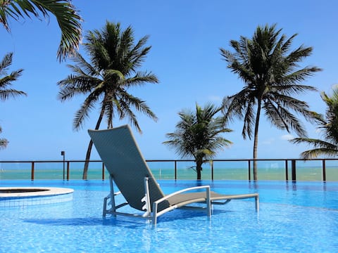 Apt for family in a condominium resort foot-in-sand-sand