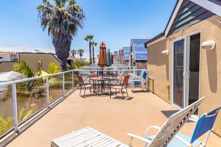 Mission Beach House with a rooftop deck