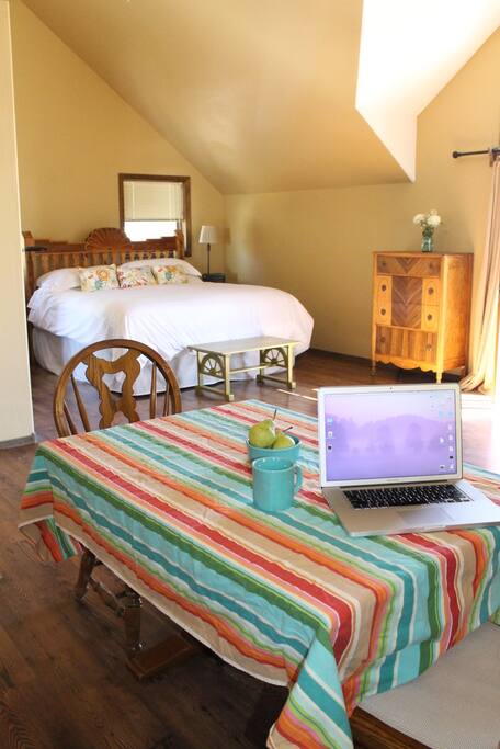 Dining table doubles as work station